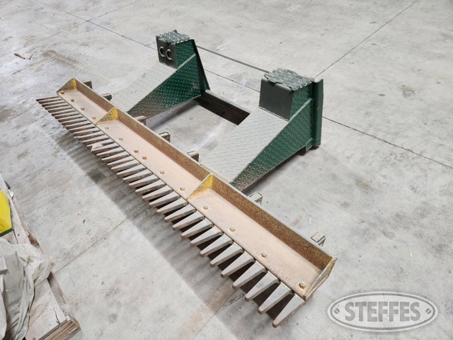 Shop-built skid steer scarifier/rock rake